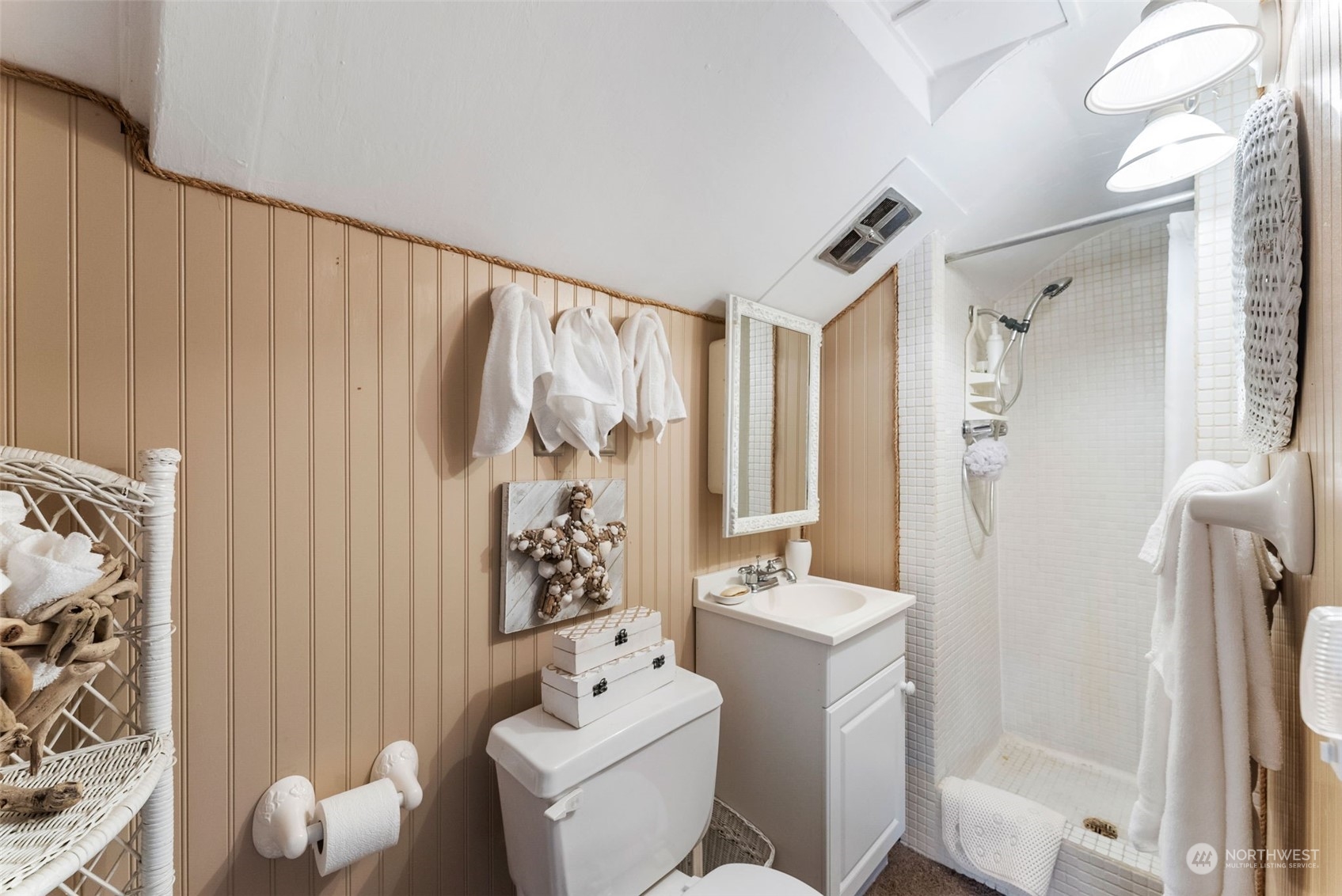 7911 East Maple Street Port Orchard, WA 98366 - Photo 34 of 39 a bathroom with a sink toilet and shower