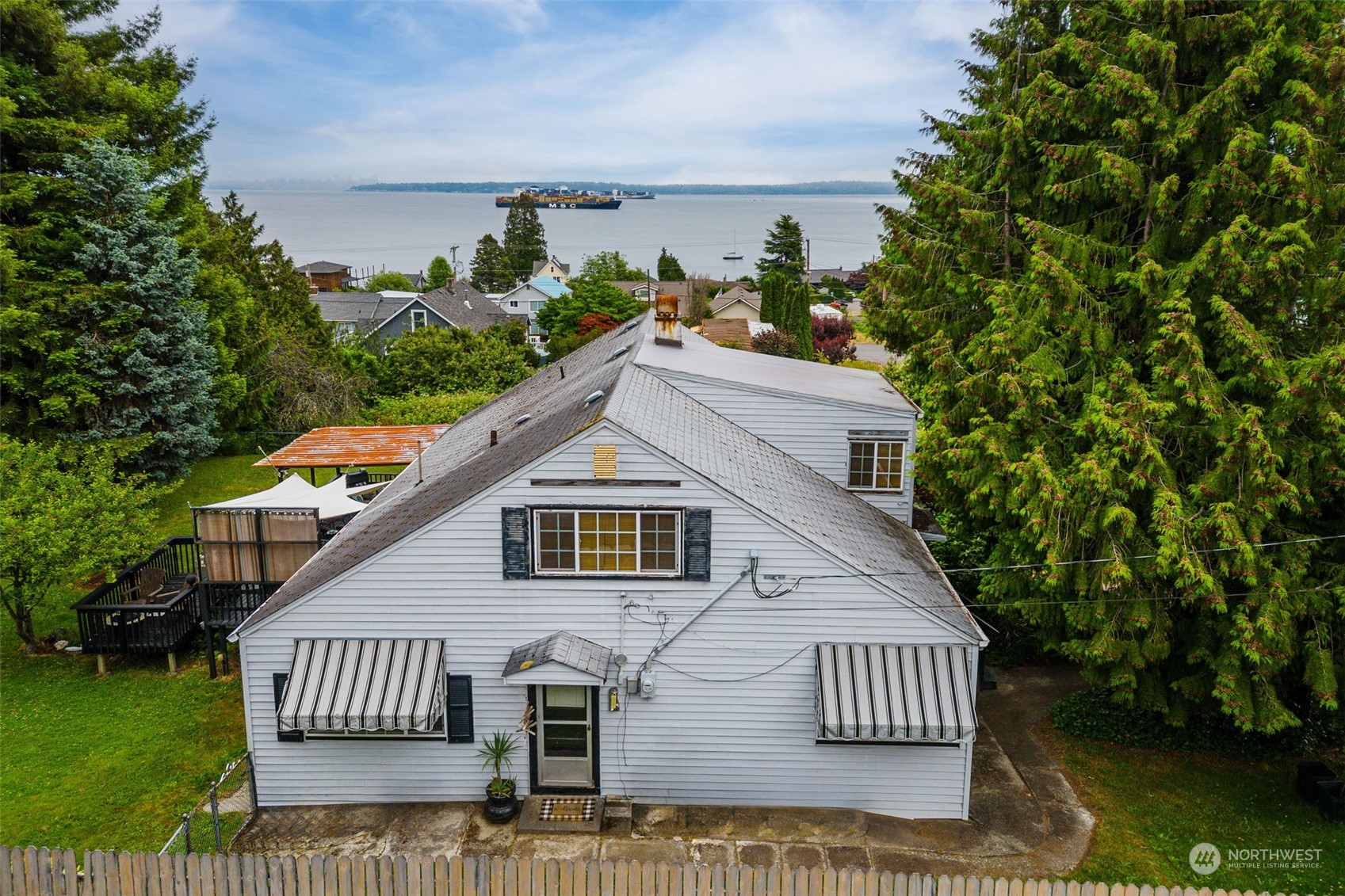 7911 East Maple Street Port Orchard, WA 98366 - Photo 37 of 39 a house view with a garden space
