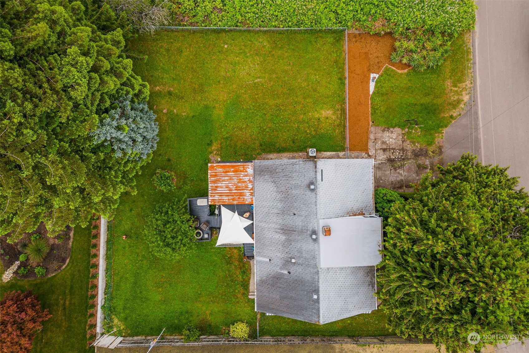 7911 East Maple Street Port Orchard, WA 98366 - Photo 38 of 39 an aerial view of a house with a yard
