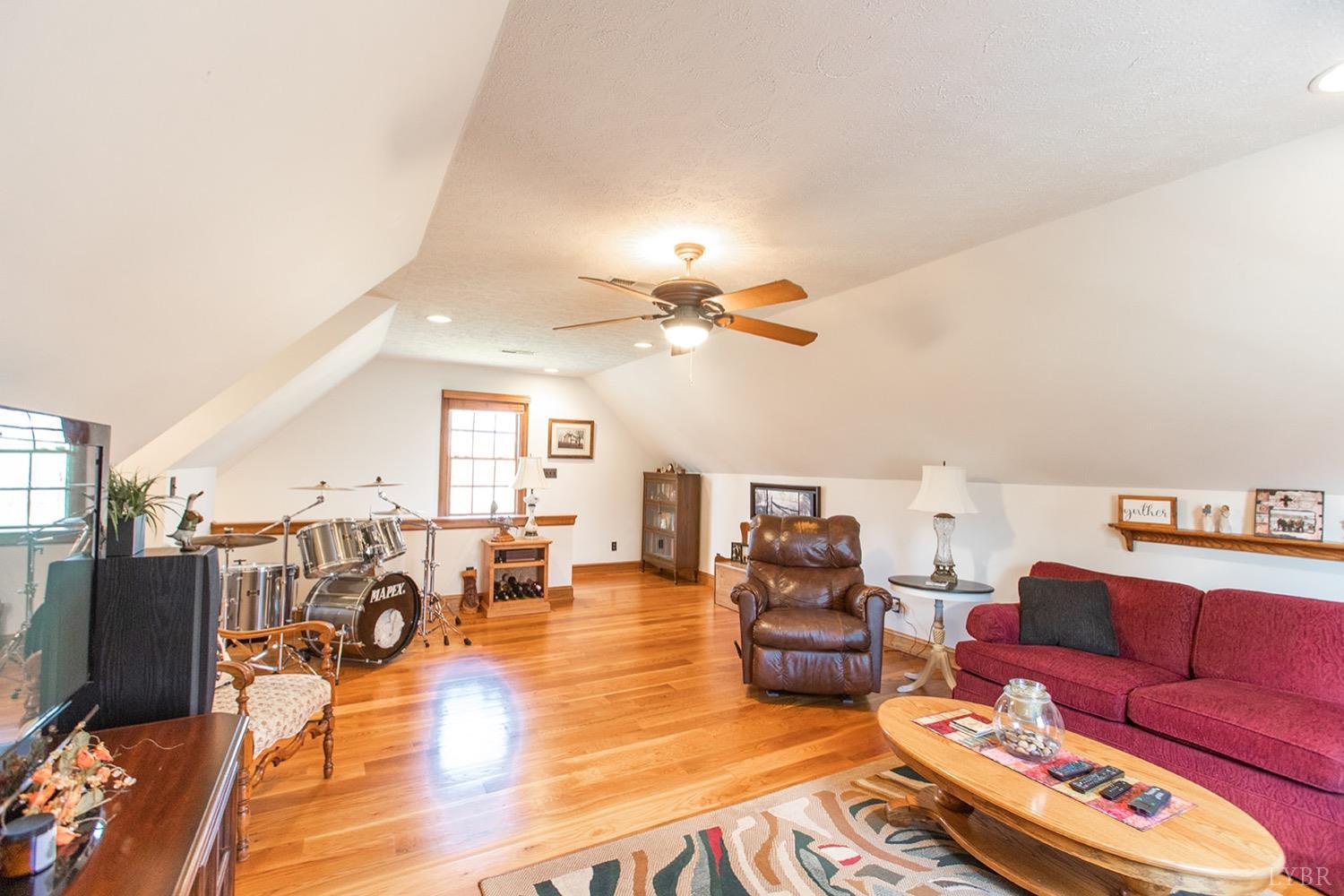 2096 Austin Mill Road Evington, VA 24550 - Photo 20 of 44 a living room with furniture and wooden floor