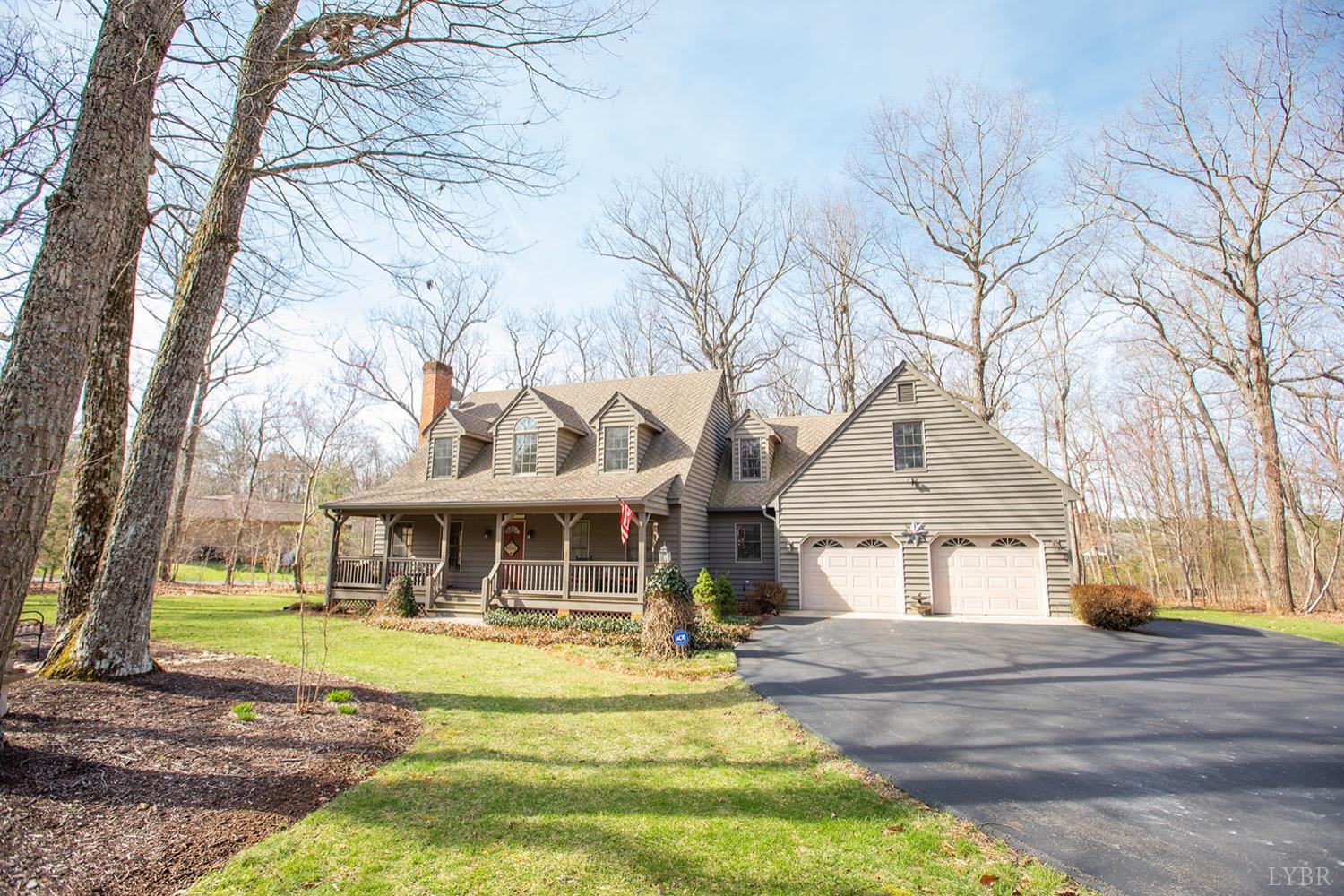 2096 Austin Mill Road Evington, VA 24550 - Photo 2 of 44 a front view of a house with a yard