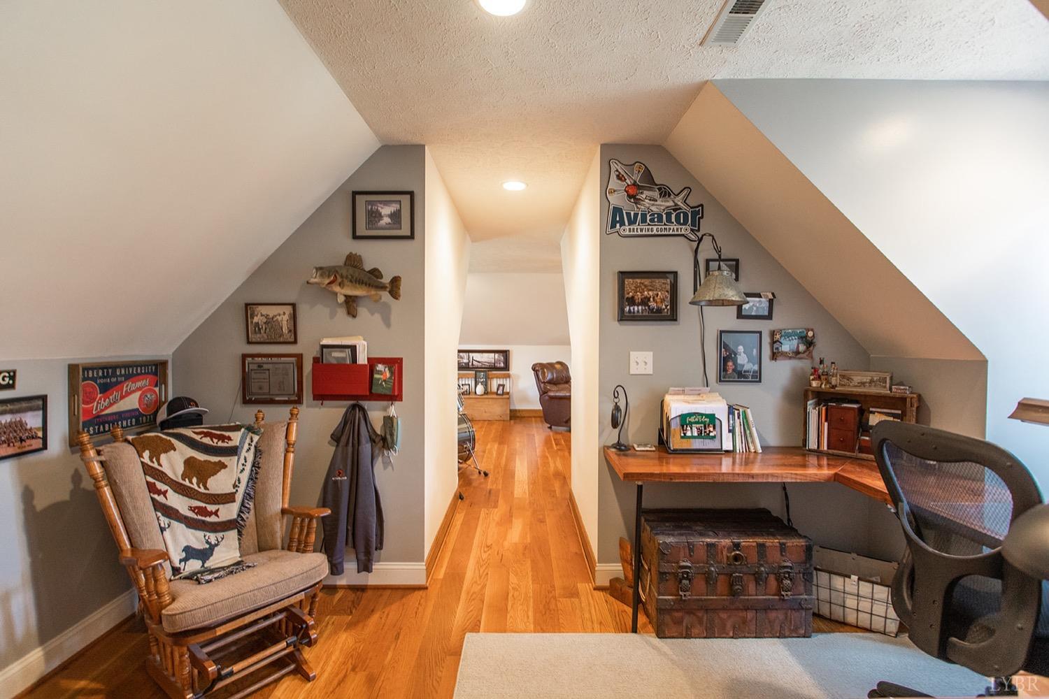 2096 Austin Mill Road Evington, VA 24550 - Photo 22 of 44 a living room with furniture and wooden floor