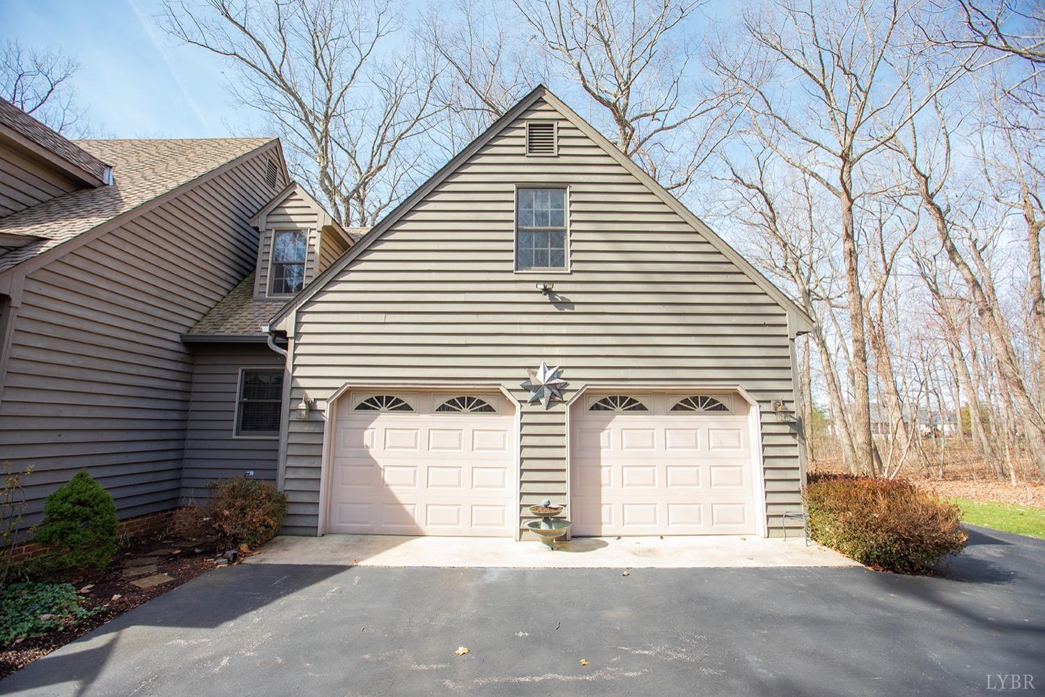 2096 Austin Mill Road Evington, VA 24550 - Photo 3 of 44 a view of a house with a yard and garage