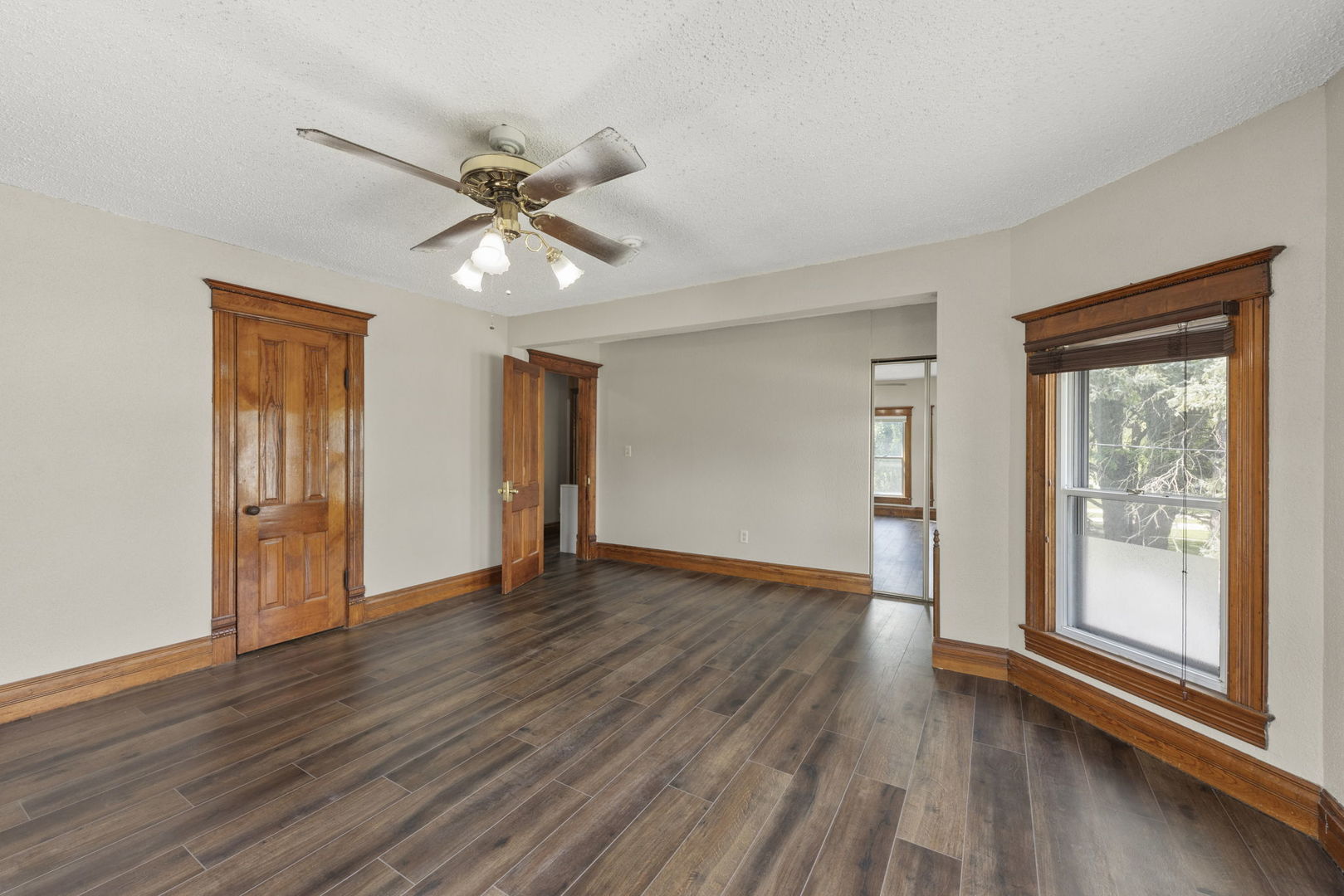301 North Main Street Herscher, IL 60941 - Photo 16 of 34 a view of an empty room with wooden floor and a window