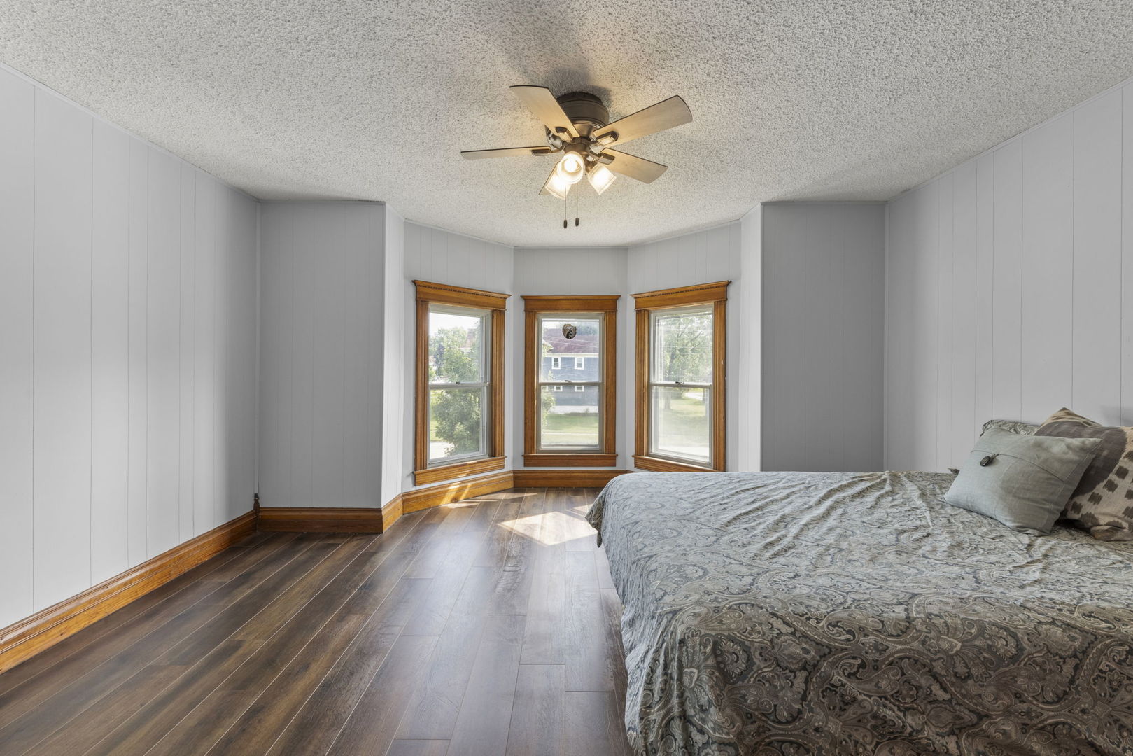 301 North Main Street Herscher, IL 60941 - Photo 19 of 34 a bedroom with a large bed and a large window