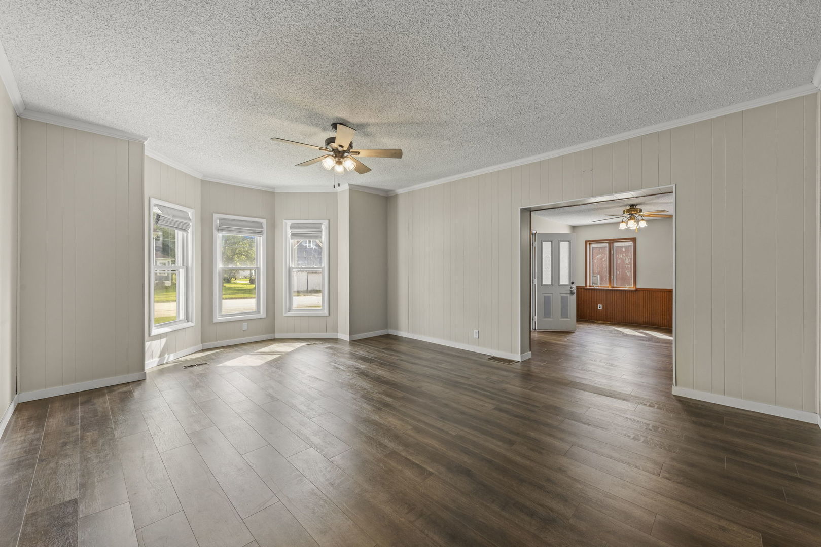 301 North Main Street Herscher, IL 60941 - Photo 7 of 34 a view of an empty room with window and wooden floor