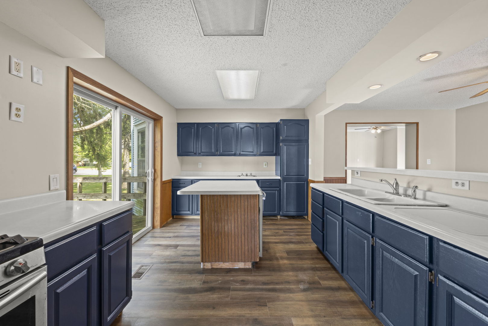 301 North Main Street Herscher, IL 60941 - Photo 9 of 34 a kitchen with counter top space and wooden floor