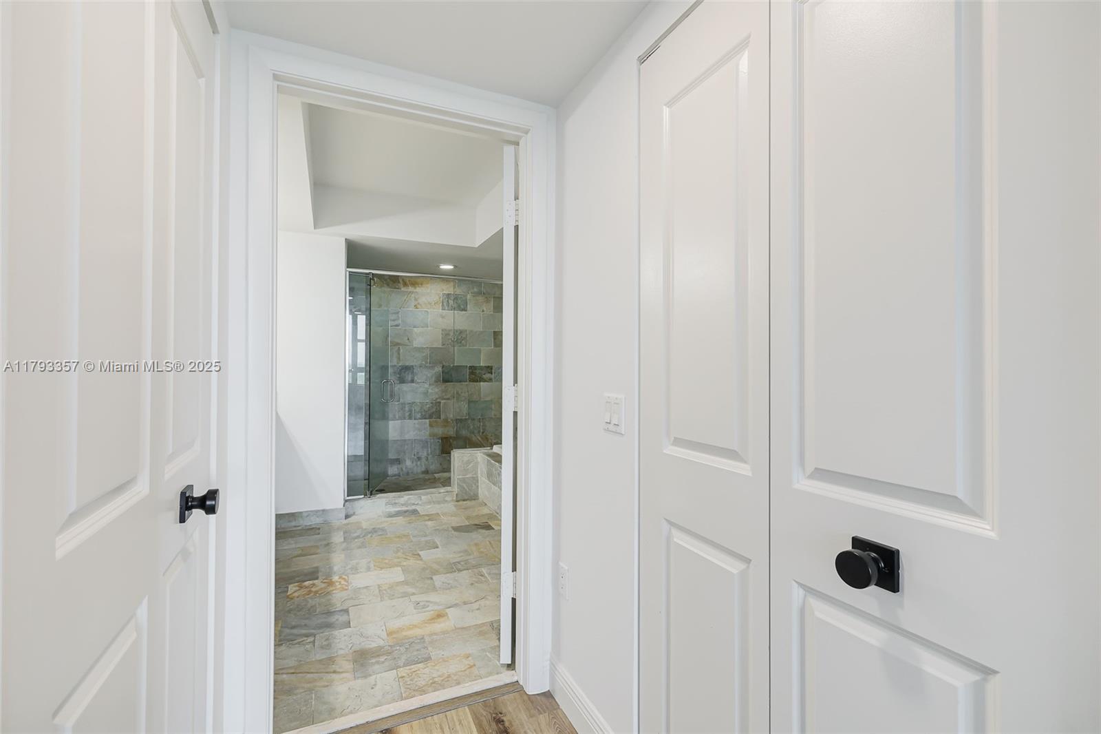 2641 North Flamingo Road, Unit 1205N Sunrise, FL 33323 - Photo 15 of 31 a bathroom with a glass shower door