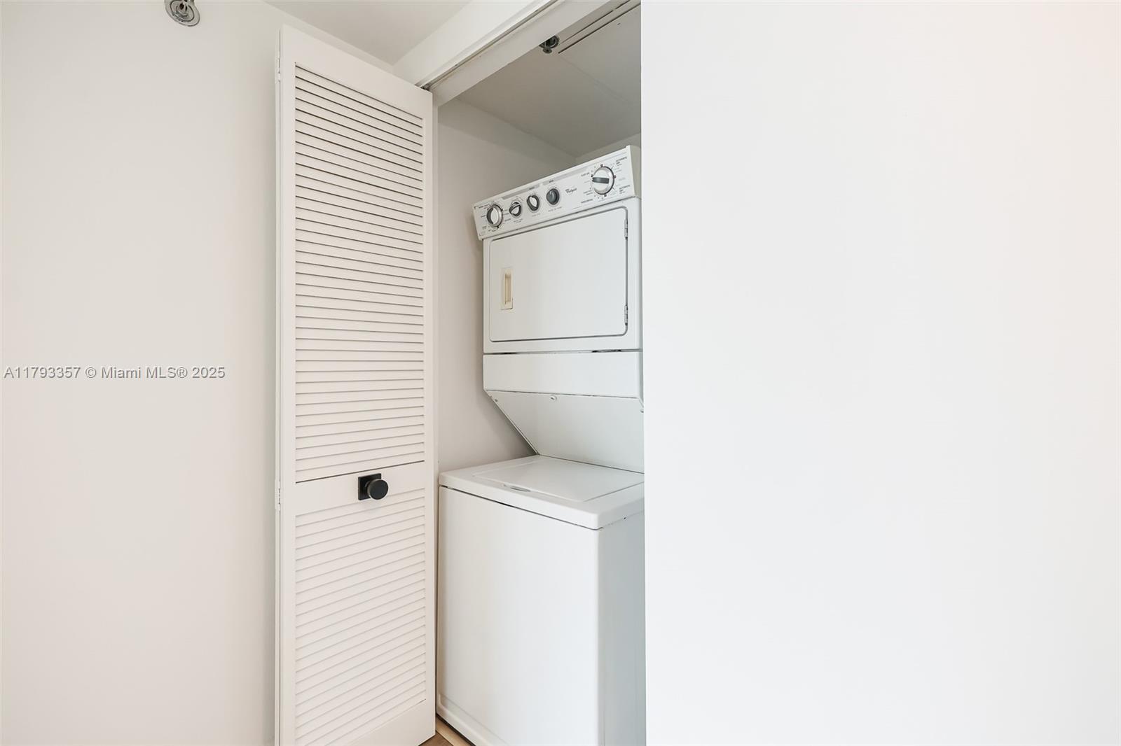 2641 North Flamingo Road, Unit 1205N Sunrise, FL 33323 - Photo 21 of 31 a utility room with dryer and washer
