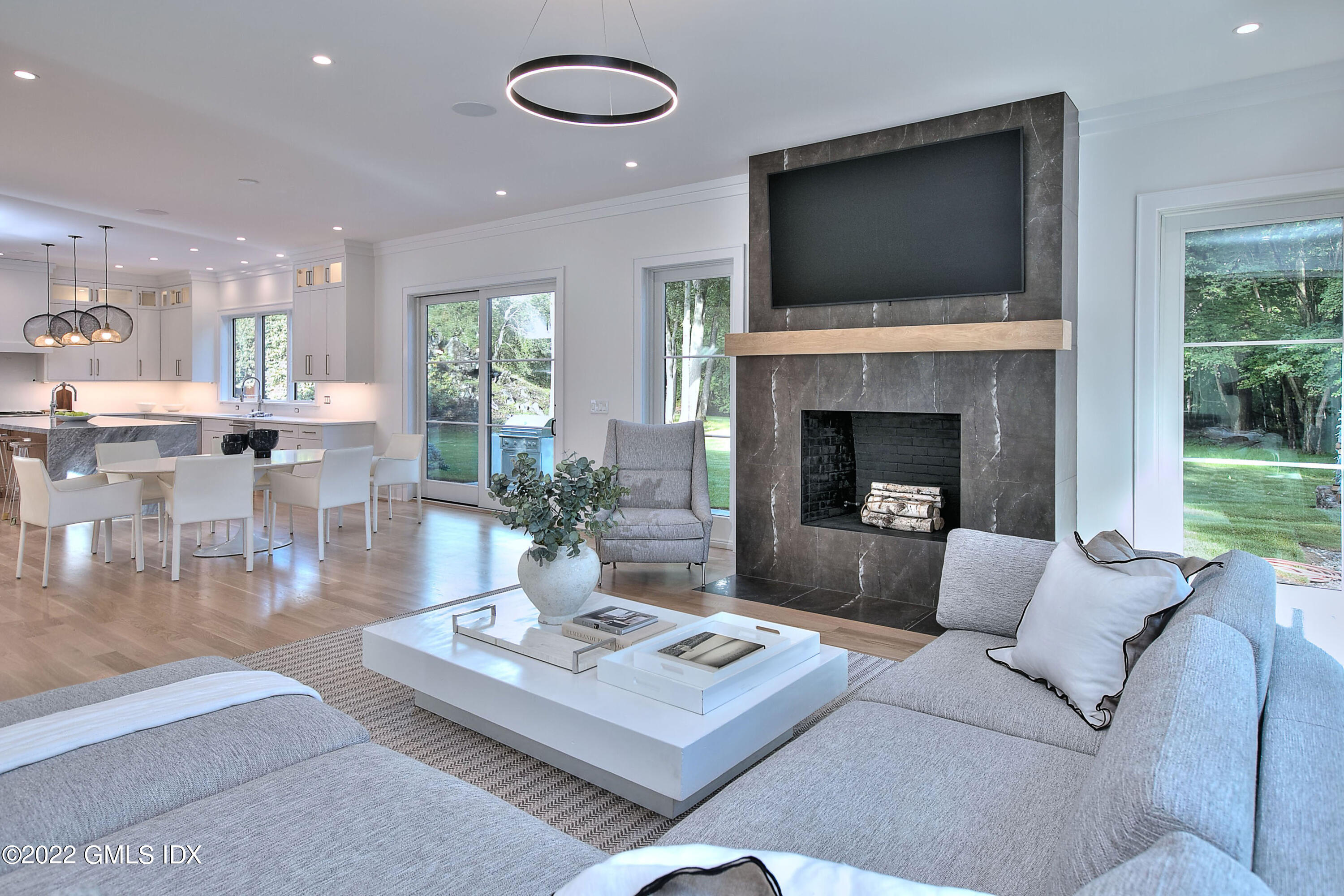 29 Narrow Rocks Road Westport, CT 06880 - Photo 14 of 39 a living room with furniture a flat screen tv and a fireplace