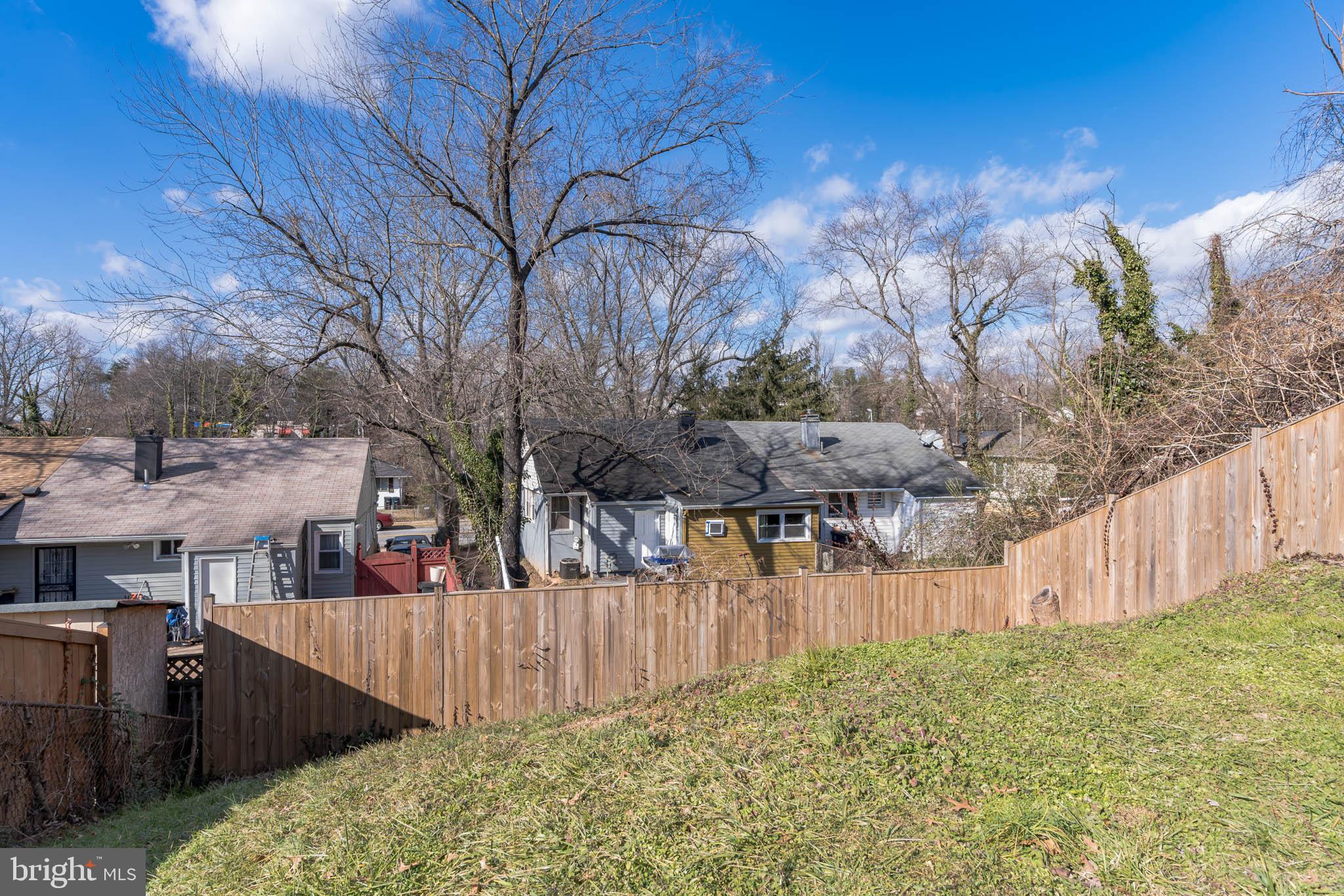 7626 Normandy Road Landover, MD 20785 - Photo 22 of 27 a view of a backyard of the house