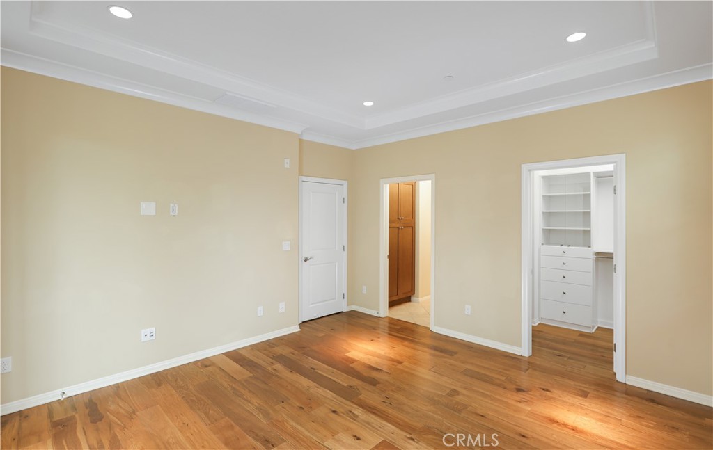 220 Kempton Irvine, CA 92620 - Photo 25 of 42 a view of an empty room with wooden floor