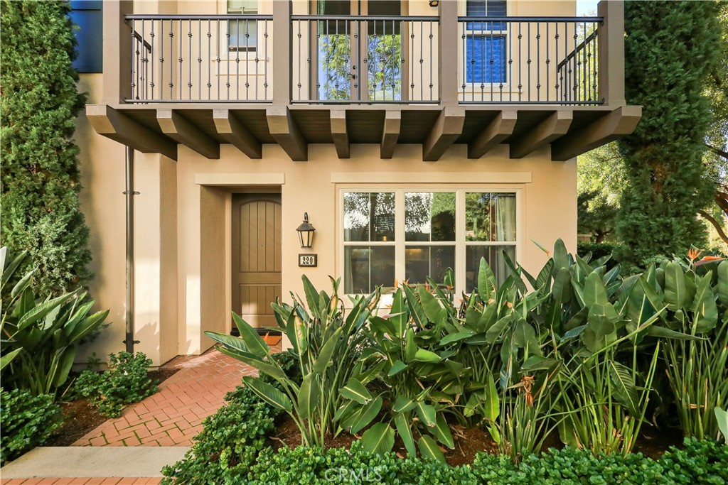 220 Kempton Irvine, CA 92620 - Photo 41 of 42 a front view of a building with a garden
