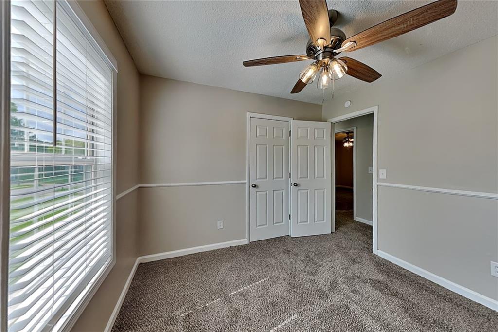 108 Ivy Trace Lane Dallas, GA 30157 - Photo 18 of 23 an empty room with fan