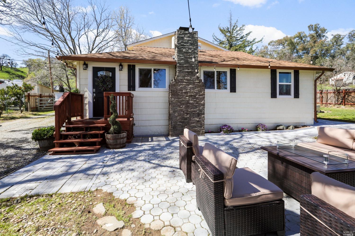 5765 Cherry Glen Road Vacaville, CA 95688 - Photo 1 of 1 a view of a house with backyard and sitting area