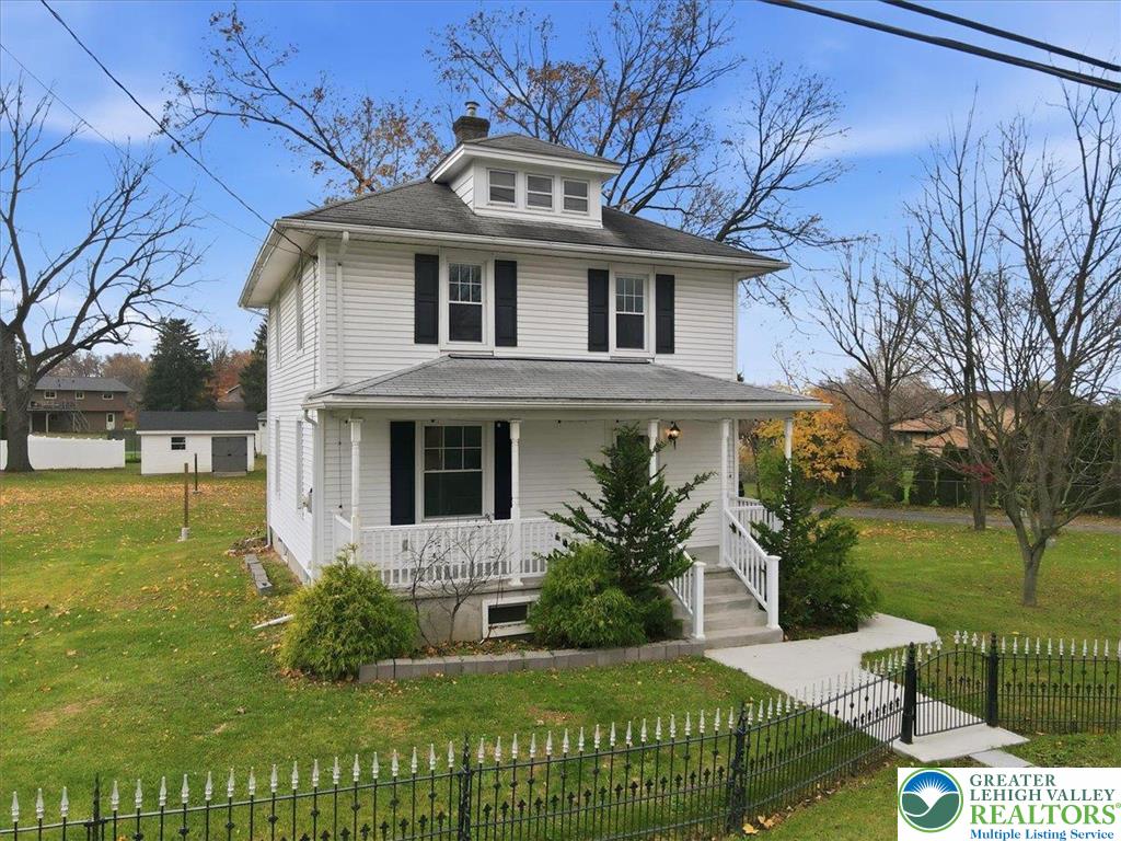 4441 Newburg Road Nazareth, PA 18064 - Photo 1 of 65 a front view of a house with garden