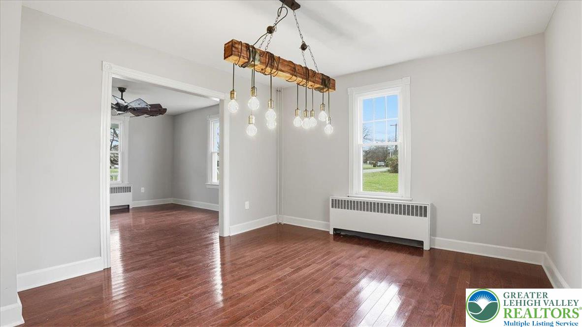 4441 Newburg Road Nazareth, PA 18064 - Photo 13 of 65 a view of empty room with wooden floor and fan