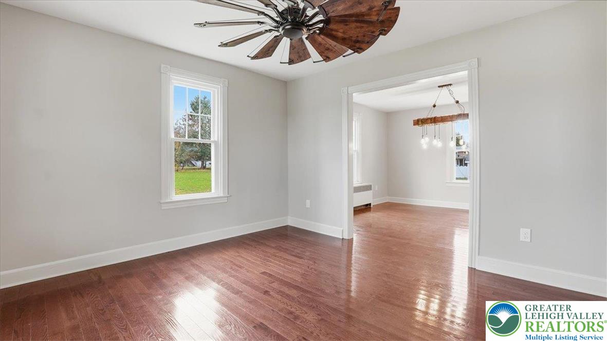 4441 Newburg Road Nazareth, PA 18064 - Photo 7 of 65 an empty room with wooden floor closet and windows