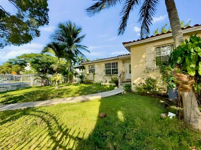 2701 Southwest 29th Avenue Miami, FL 33133 - Photo 12 of 17 a view of a house with a yard