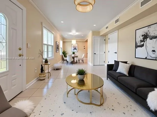 a living room with furniture and a large window