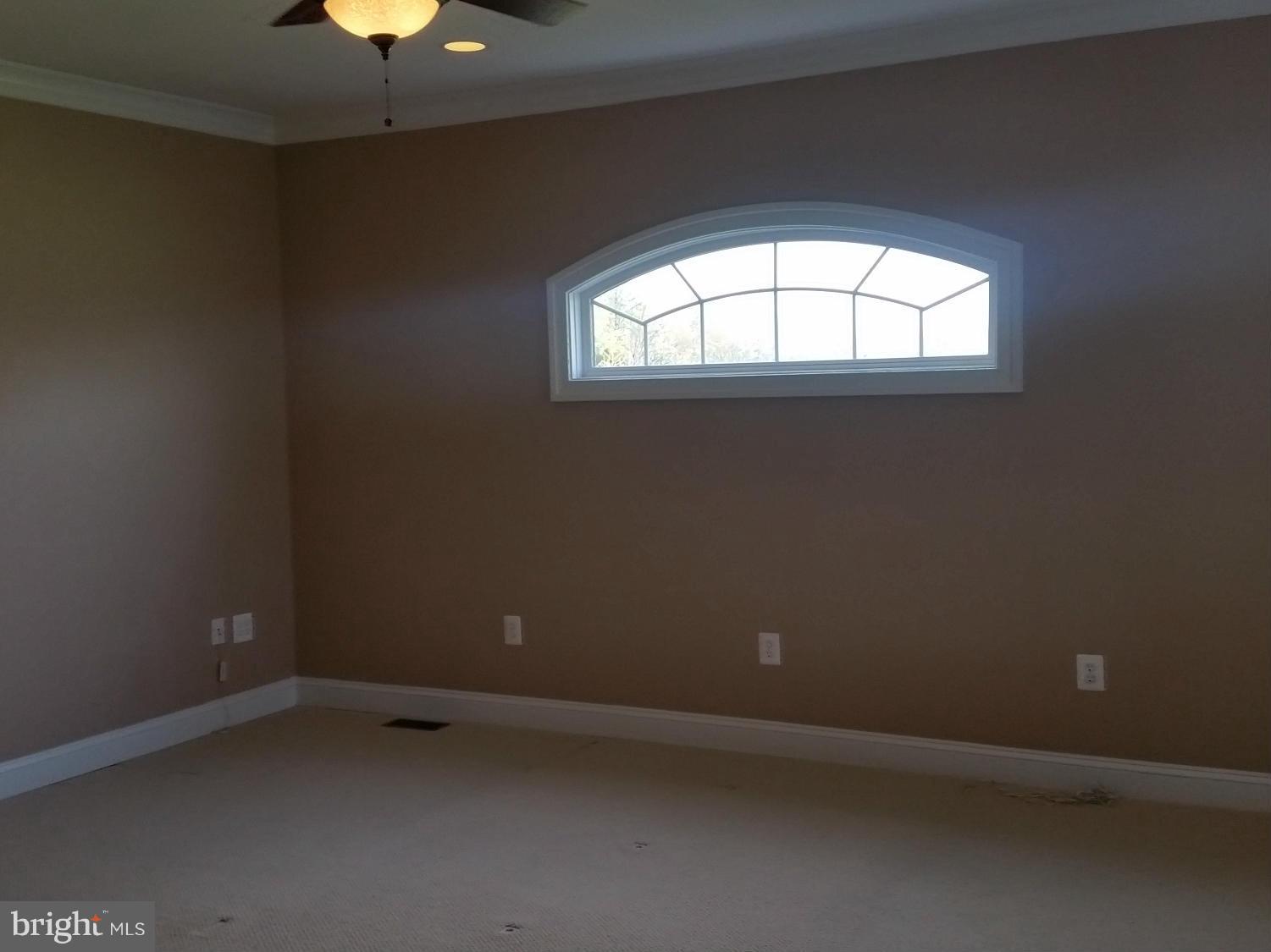 26377 Independence Road Rhoadesville, VA 22542 - Photo 17 of 30 LOVELY ARCHED WINDOW IN MASTER BEDROOM