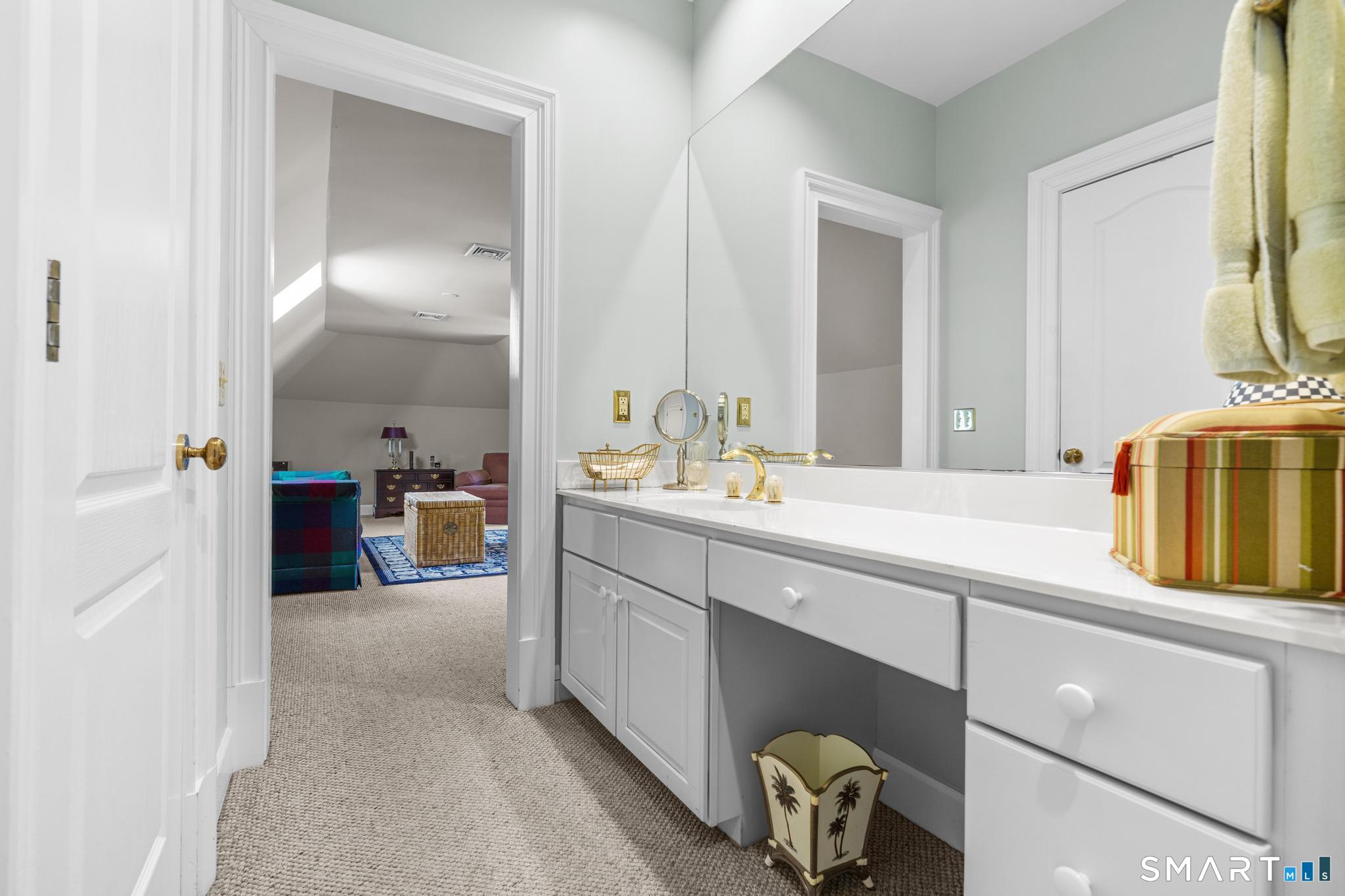 130 Stillson Road, Unit 130 Fairfield, CT 06825 - Photo 23 of 38 Second bathroom on second level is a jack-and-jill design with two separate sinks/vanities, shower/tub, and walk-in-closet that services Bedroom #3