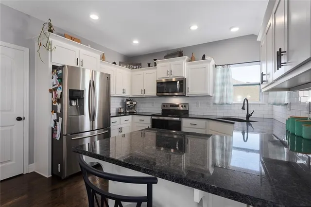 $410,000 | 2805 East Cedar Place, Tonganoxie, KS 66086