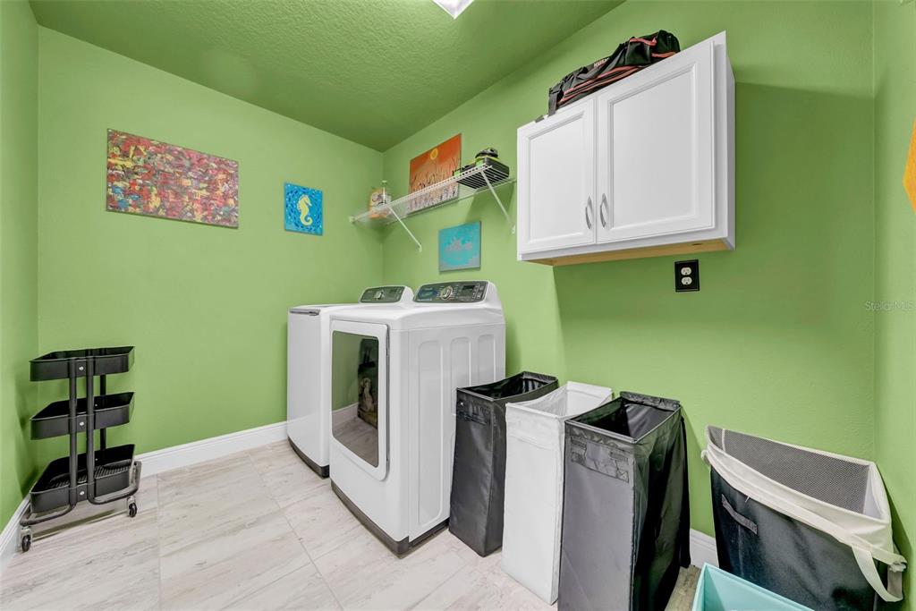 4007 Palm Key Avenue Oldsmar, FL 34677 - Photo 16 of 30 a utility room with dryer and washer