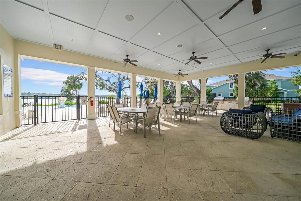 4007 Palm Key Avenue Oldsmar, FL 34677 - Photo 22 of 30 a outdoor space with lots of tables and chairs