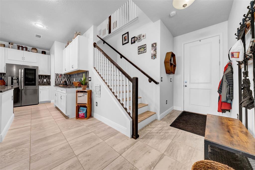4007 Palm Key Avenue Oldsmar, FL 34677 - Photo 10 of 30 a view of a hallway with seating and kitchen view