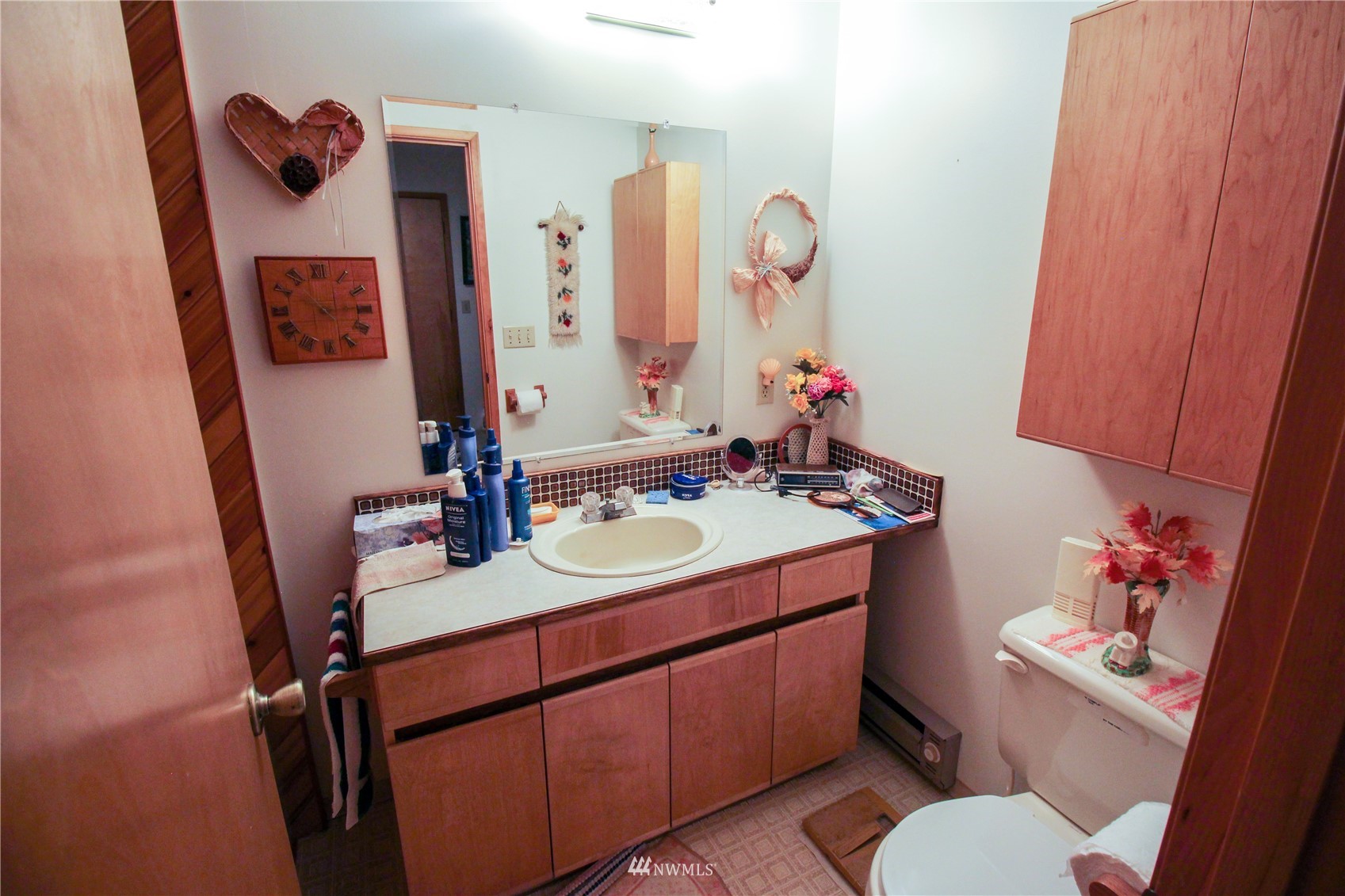 8014 Valley View Road Custer, WA 98240 - Photo 17 of 28 a bathroom with a sink vanity mirror and toilet
