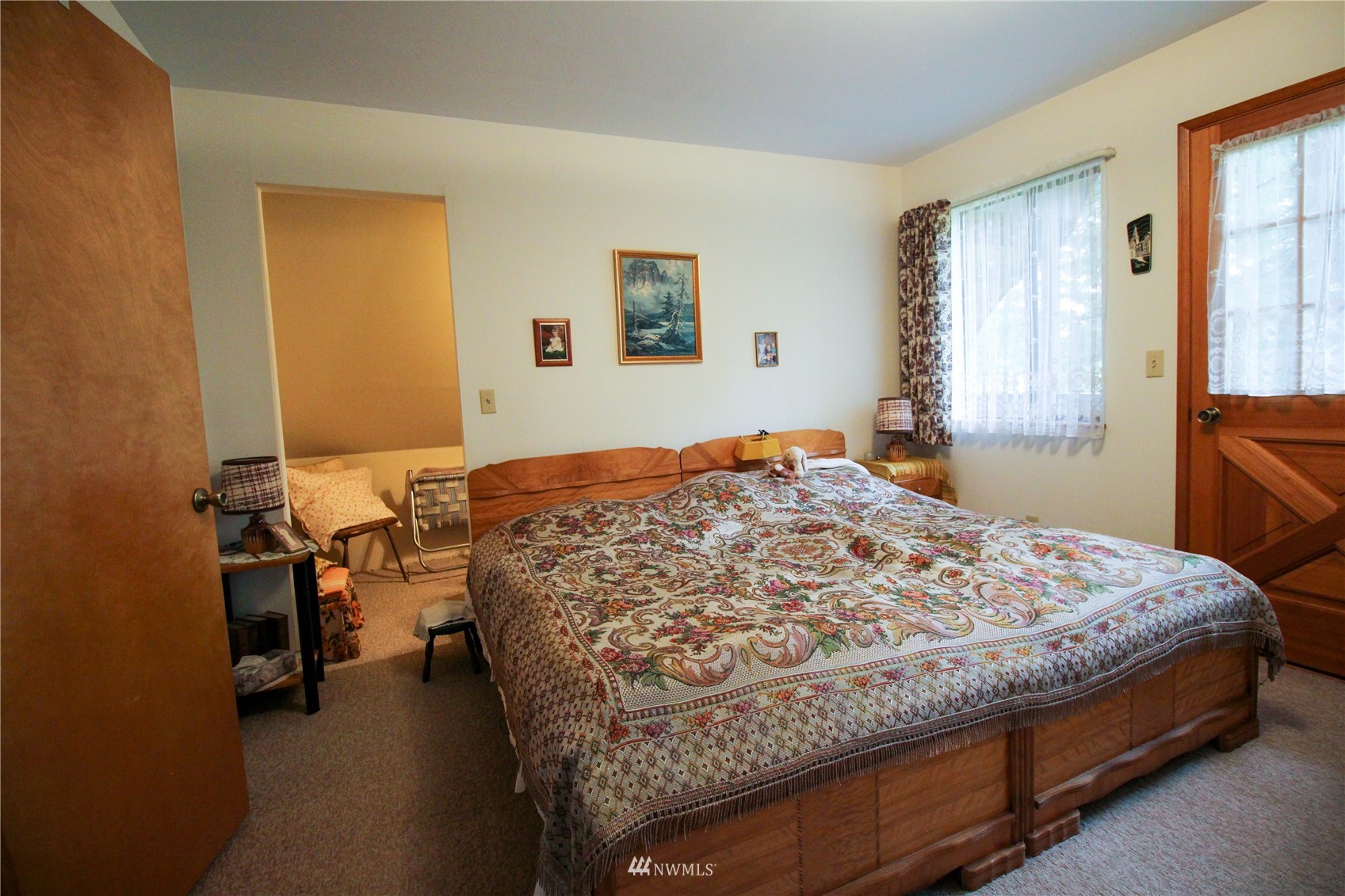 8014 Valley View Road Custer, WA 98240 - Photo 21 of 28 a bedroom with a bed and dresser with mirror