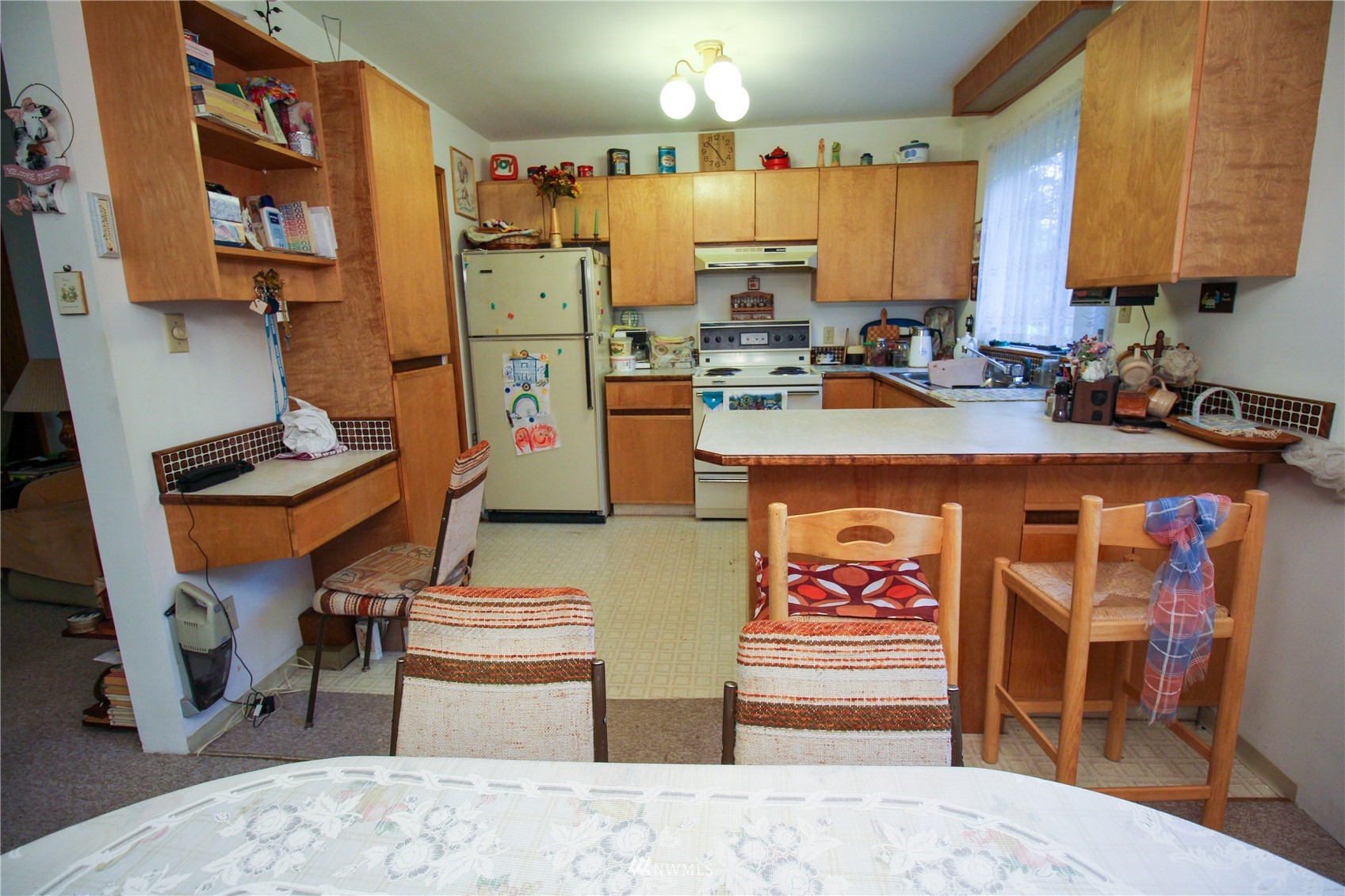8014 Valley View Road Custer, WA 98240 - Photo 4 of 28 a kitchen with stainless steel appliances granite countertop a refrigerator a stove and a sink