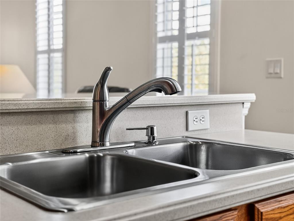 920 Spring Park Street, Unit 303 Celebration, FL 34747 - Photo 14 of 40 a close view of sink and tap