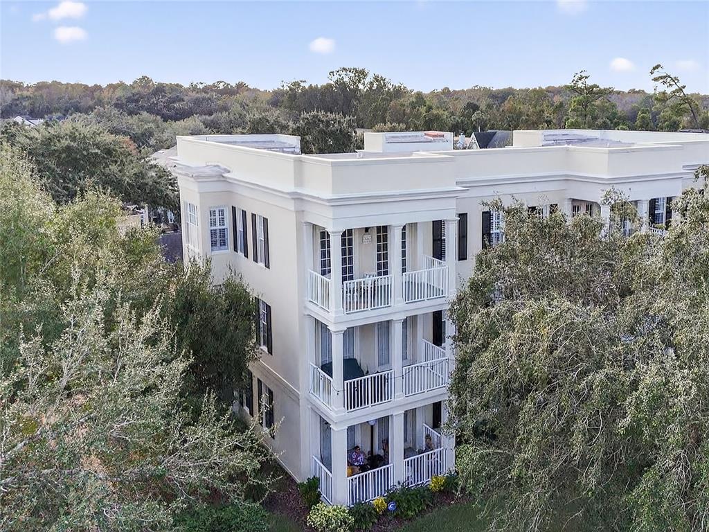 920 Spring Park Street, Unit 303 Celebration, FL 34747 - Photo 2 of 40 a view of a large building