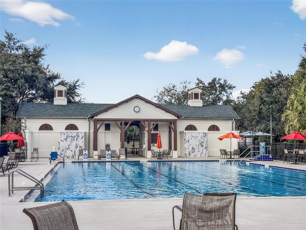 920 Spring Park Street, Unit 303 Celebration, FL 34747 - Photo 33 of 40 a view of a house with swimming pool