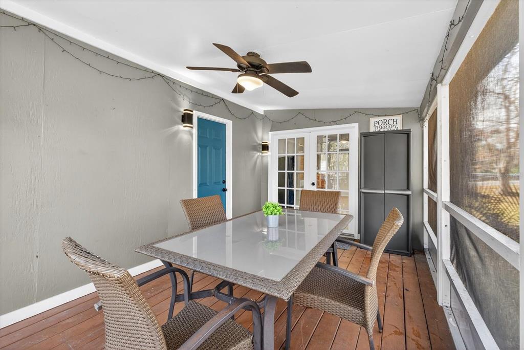 7286 Aberdeen Court Weeki Wachee, FL 34607 - Photo 20 of 37 a view of a dining room with furniture window and wooden floor