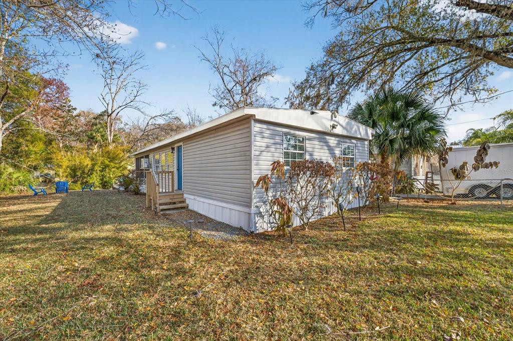 7286 Aberdeen Court Weeki Wachee, FL 34607 - Photo 29 of 37 a view of a house with a yard