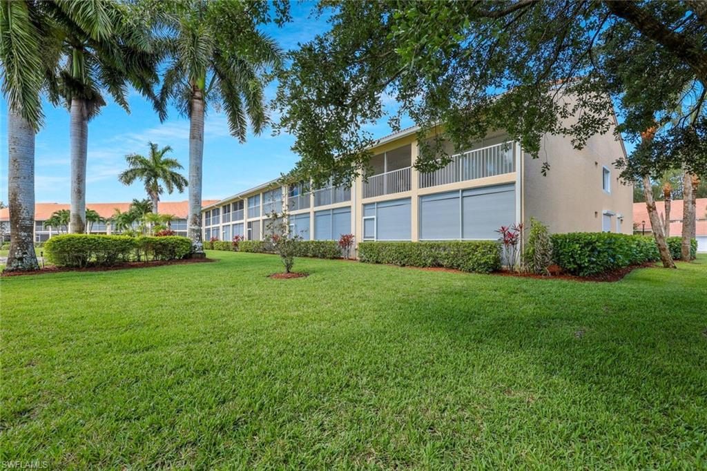 2395 Bayou Lane, Unit 7304 Naples, FL 34112 - Photo 27 of 27 THE REAR OF THE BUILDING