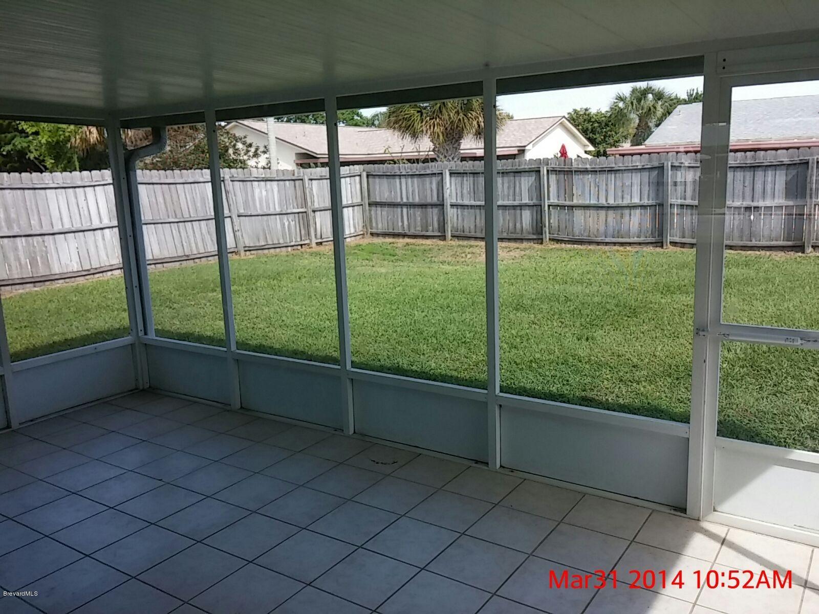 1920 Talloak Road Melbourne, FL 32935 - Photo 14 of 15 Covered, Screened Patio