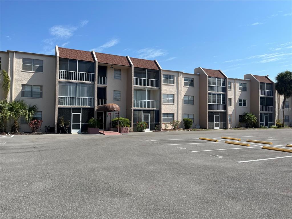 a front view of a building with a street