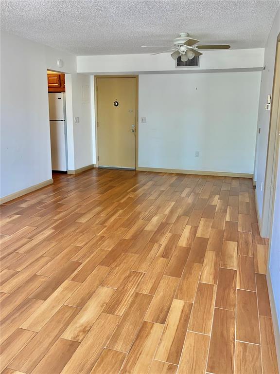 519 Albee Farm Road, Unit 303 Venice, FL 34285 - Photo 12 of 58 a view of a room with wooden floor