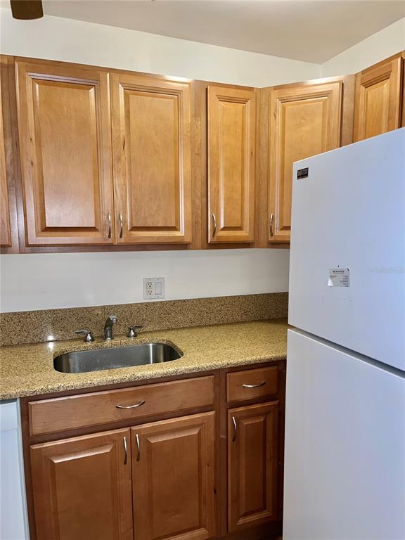 519 Albee Farm Road, Unit 303 Venice, FL 34285 - Photo 16 of 58 a view of a storage and utility room with a sink