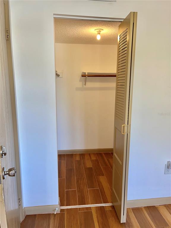 519 Albee Farm Road, Unit 303 Venice, FL 34285 - Photo 20 of 58 a bathroom with a glass shower door