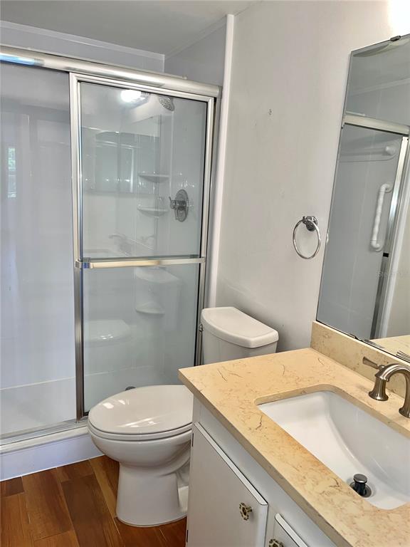 519 Albee Farm Road, Unit 303 Venice, FL 34285 - Photo 26 of 58 a bathroom with a sink and a mirror
