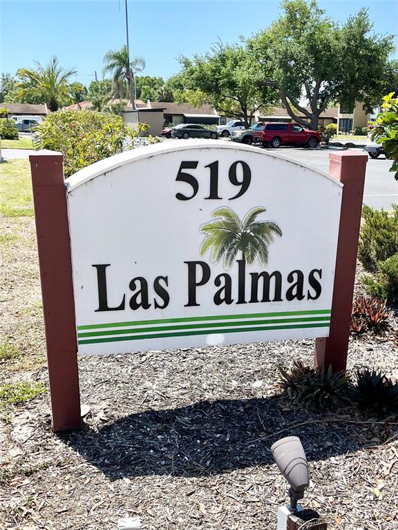 519 Albee Farm Road, Unit 303 Venice, FL 34285 - Photo 3 of 58 a sign on the side of a building