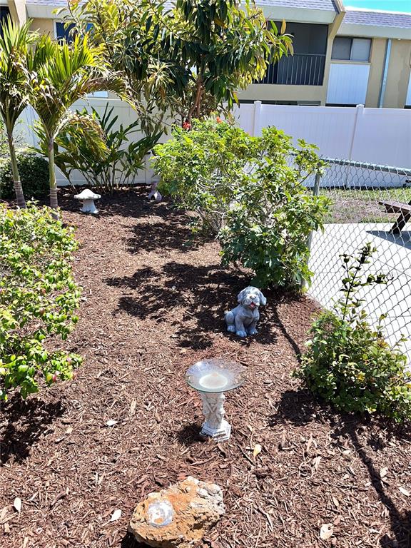 519 Albee Farm Road, Unit 303 Venice, FL 34285 - Photo 34 of 58 a view of a backyard of the house