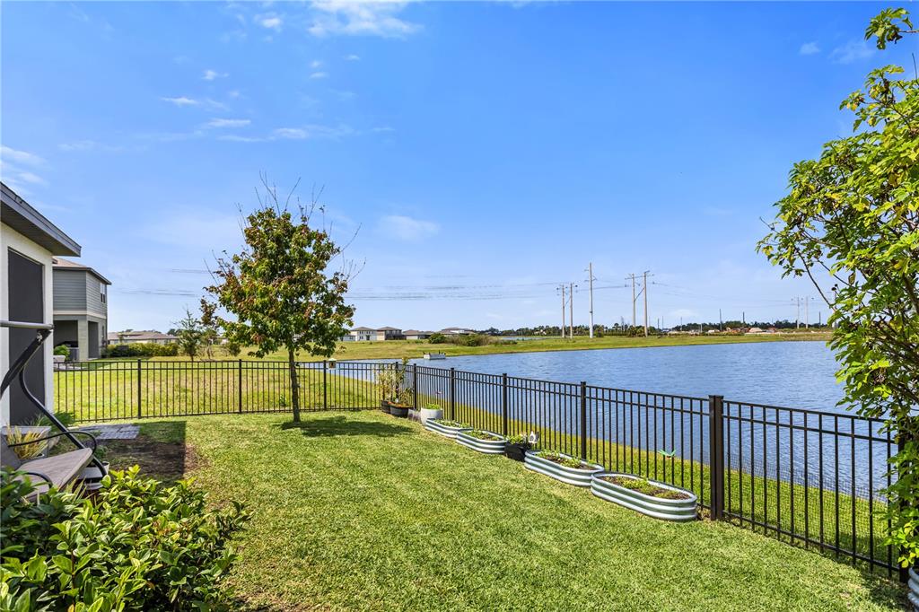 10459 Ladybug Cove Parrish, FL 34219 - Photo 29 of 36 a view of a yard with a park