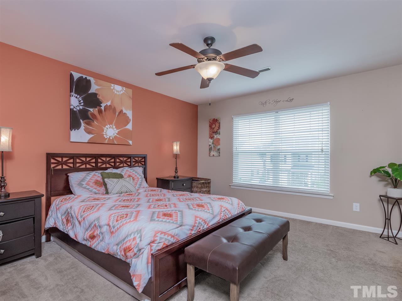 604 Smith Ridge Way Fuquay-Varina, NC 27526 - Photo 22 of 30 This lovely master bedroom is flooded with natural light!