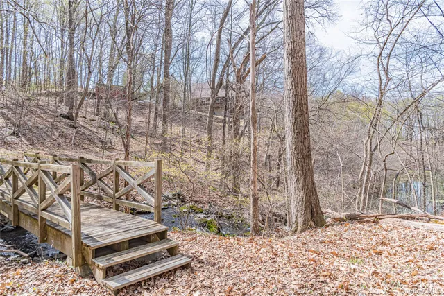 a aerial view of a house with a yard